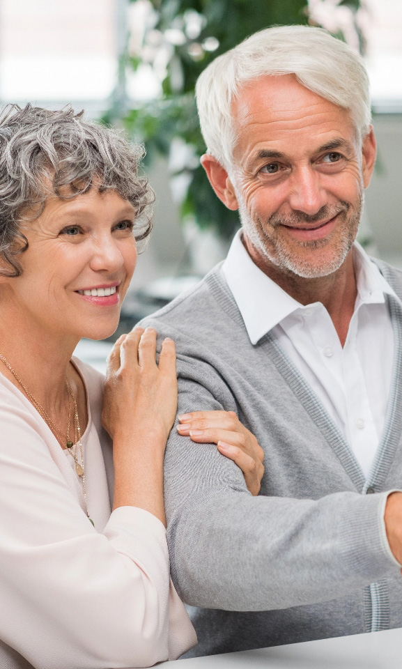 Smiling retired couple