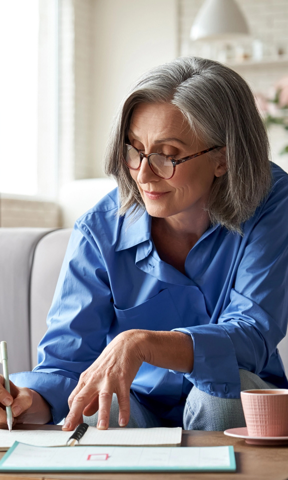 Successful older woman planning